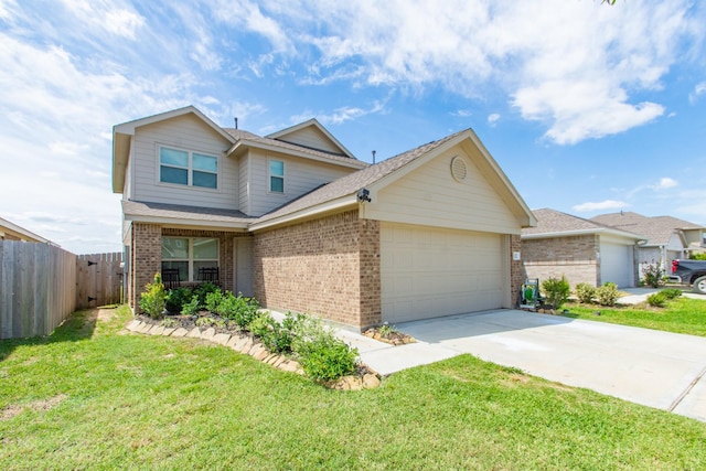 122 Austin Rd, Angleton, TX 77515 - traditional home featuring a front yard, brick siding, fence, and a garage