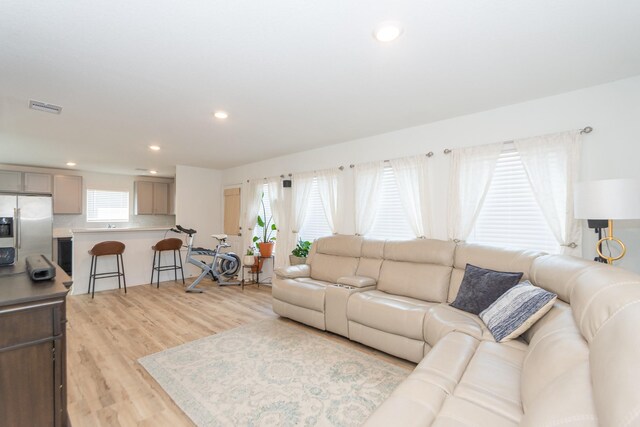 122 Austin Rd, Angleton, TX 77515 - living room with recessed lighting, visible vents, and light wood-style floors