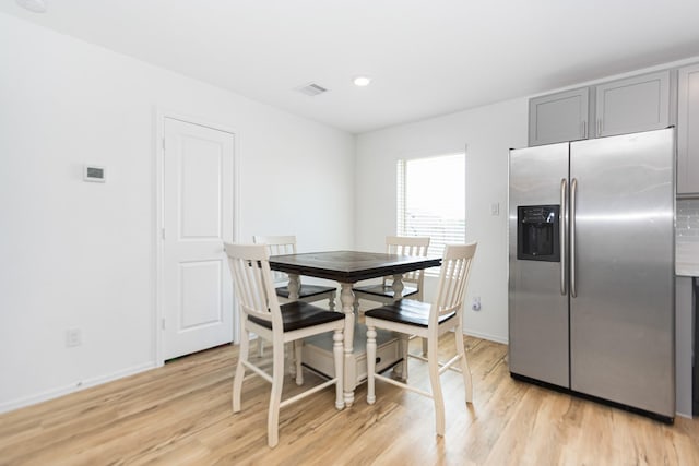 122 Austin Rd, Angleton, TX 77515 - dining room featuring baseboards, recessed lighting, visible vents, and light wood-type flooring