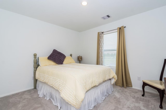 122 Austin Rd, Angleton, TX 77515 - bedroom featuring light colored carpet, visible vents, and baseboards