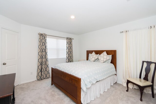 122 Austin Rd, Angleton, TX 77515 - bedroom featuring light colored carpet, baseboards, and recessed lighting