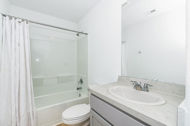 122 Austin Rd, Angleton, TX 77515 - bathroom with toilet, shower / bath combo with shower curtain, vanity, and visible vents