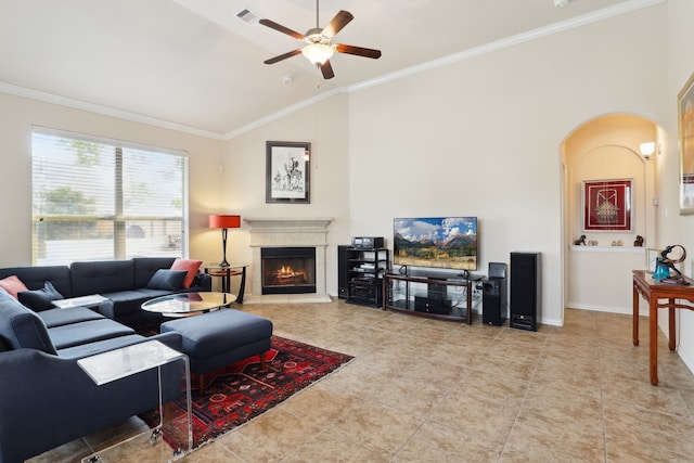 living room with high vaulted ceiling, light tile patterned floors, ceiling fan, and crown molding