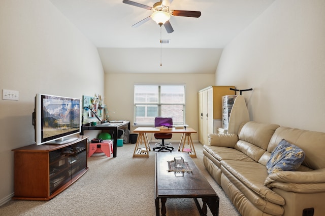 carpeted living room with ceiling fan and lofted ceiling