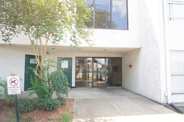 2830 S Bartell Dr Unit 39, Houston, TX 77054 - property entrance featuring stucco siding