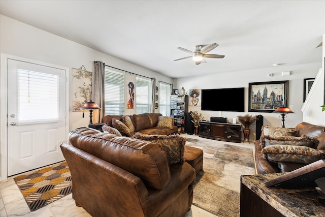 living room featuring ceiling fan