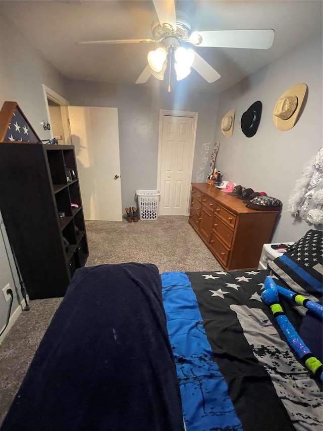 bedroom featuring carpet and ceiling fan