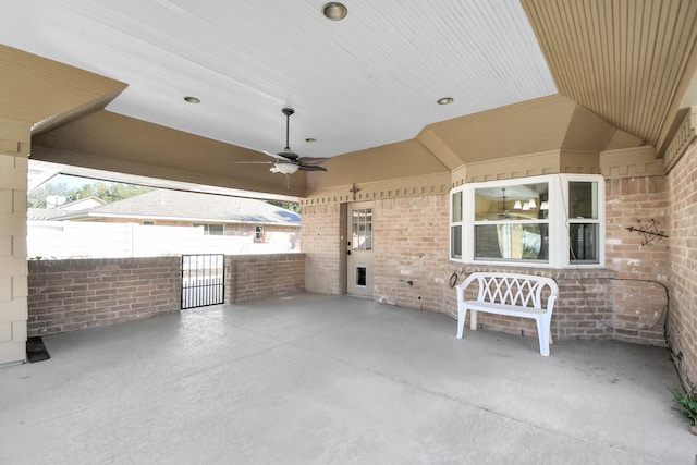 view of patio featuring ceiling fan