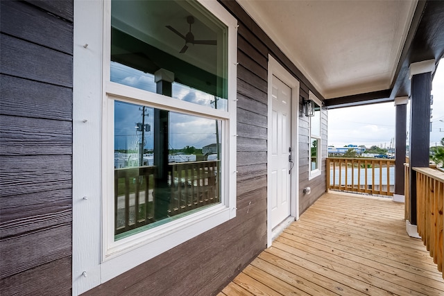 wooden terrace featuring a porch