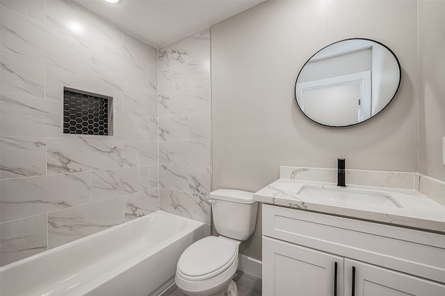 full bathroom featuring vanity, toilet, and tiled shower / bath combo