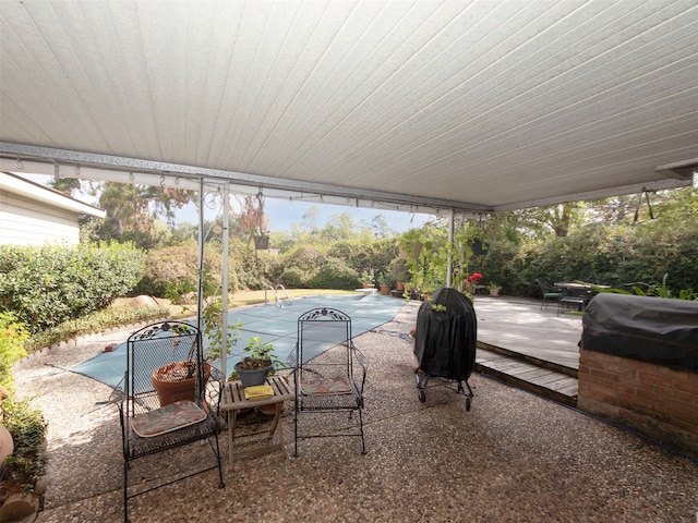 view of patio / terrace featuring area for grilling and a wooden deck