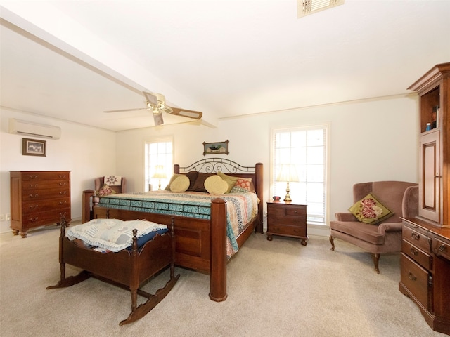 bedroom with a wall mounted air conditioner, beam ceiling, light colored carpet, and ceiling fan