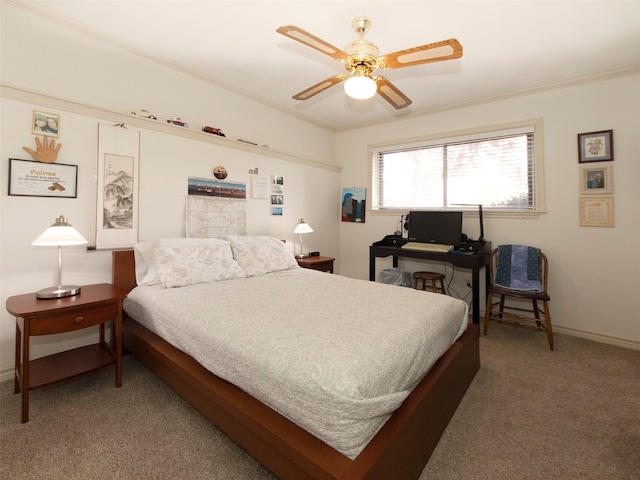 bedroom with crown molding, carpet, and ceiling fan