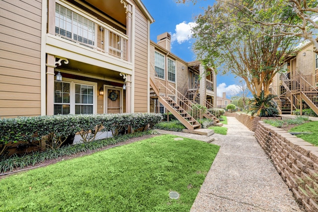 exterior space with a lawn