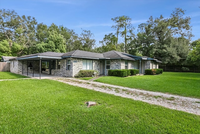 ranch-style home featuring a front yard