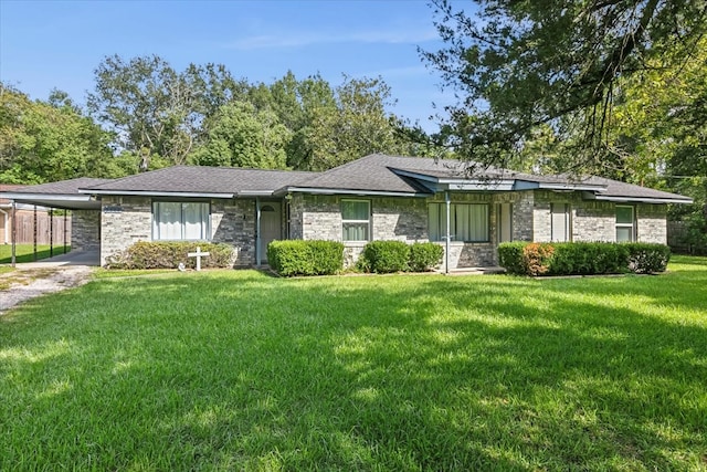 ranch-style home featuring a front yard