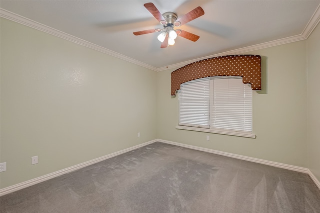 empty room with crown molding, carpet flooring, and ceiling fan