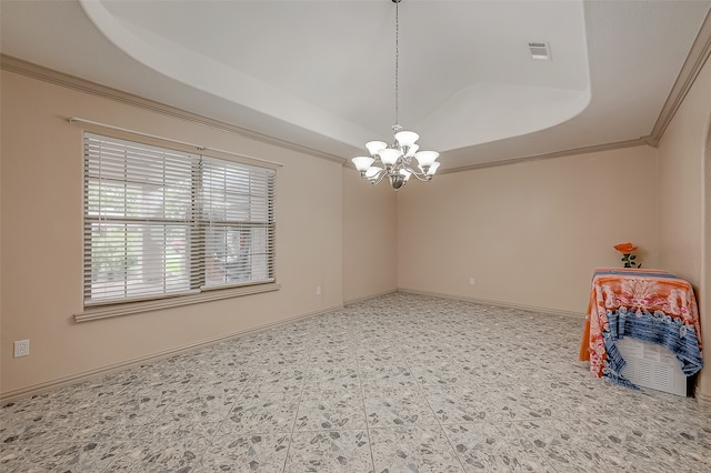 unfurnished room featuring ornamental molding, a chandelier, a tray ceiling, and tile patterned floors