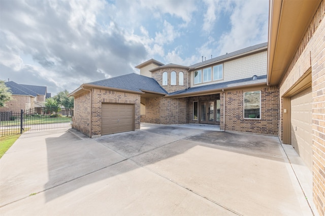 view of front of property featuring a garage