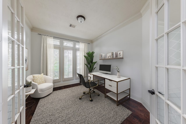 home office featuring french doors, dark wood-type flooring, a textured ceiling, and ornamental molding