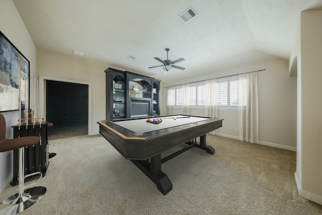 game room with ceiling fan, billiards, a textured ceiling, lofted ceiling, and light carpet