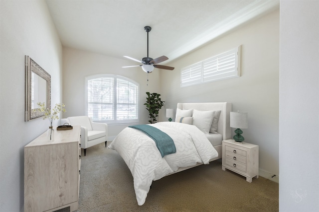 bedroom featuring ceiling fan and light colored carpet