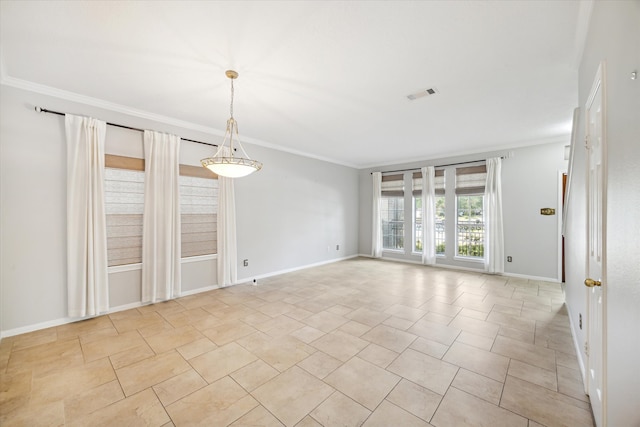 unfurnished room with ornamental molding