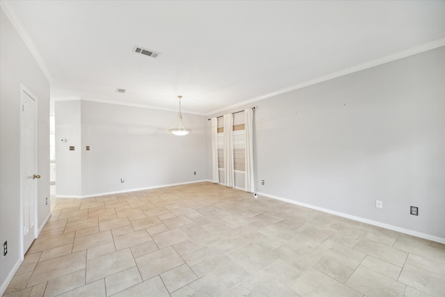 spare room featuring ornamental molding