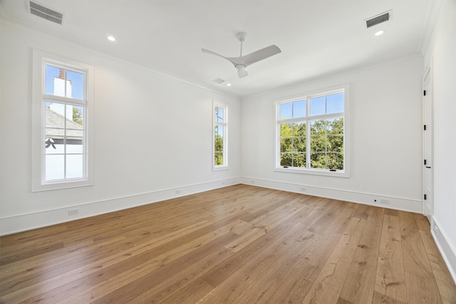 1944 Larchmont Rd, Houston, TX 77019 - unfurnished room featuring ornamental molding, healthy amount of natural light, light wood-type flooring, baseboards, and a ceiling fan