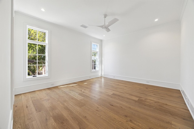 1944 Larchmont Rd, Houston, TX 77019 - spare room with ornamental molding, plenty of natural light, wood finished floors, ceiling fan, and baseboards