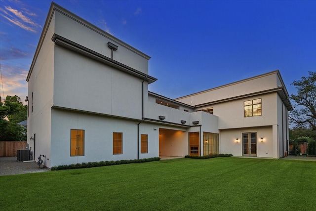 1944 Larchmont Rd, Houston, TX 77019 - rear view of property with french doors and stucco siding
