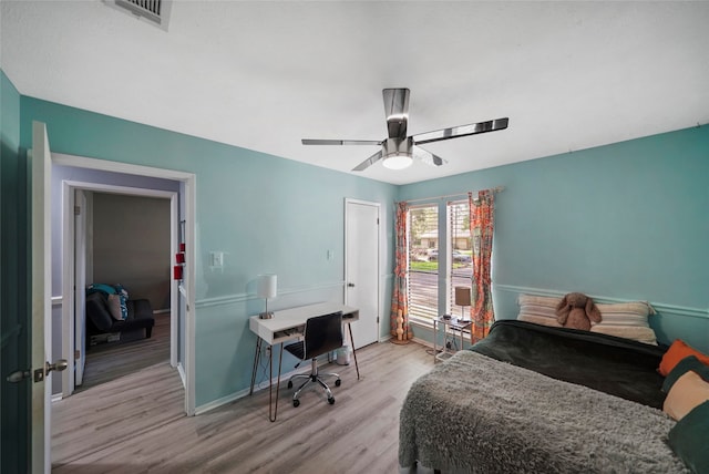 bedroom featuring ceiling fan and light hardwood / wood-style flooring