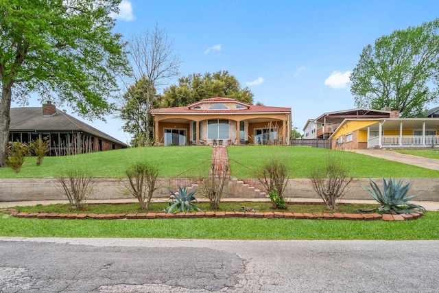 view of front of house with a front yard