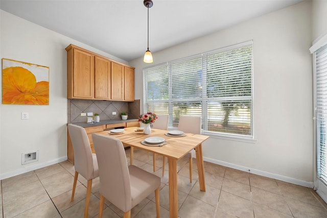 dining area with light tile patterned flooring