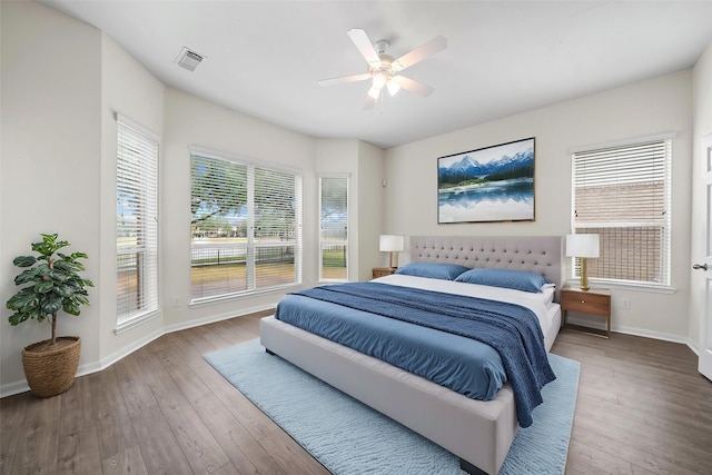 bedroom featuring hardwood / wood-style flooring and ceiling fan