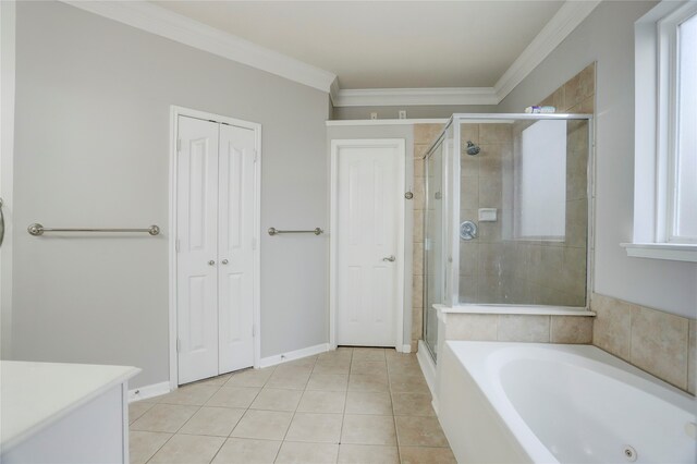 bathroom featuring tile patterned flooring, ornamental molding, and independent shower and bath