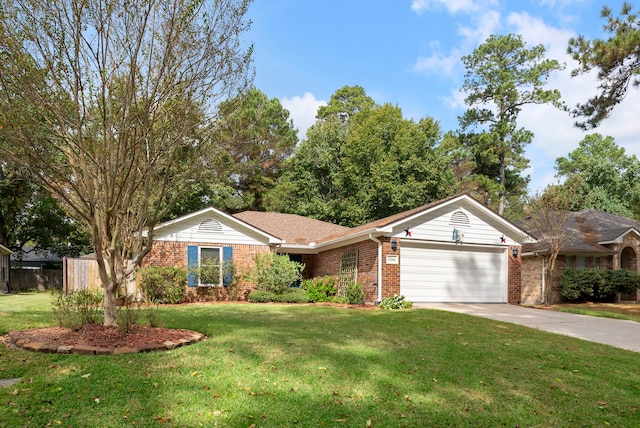 ranch-style home with a garage and a front lawn