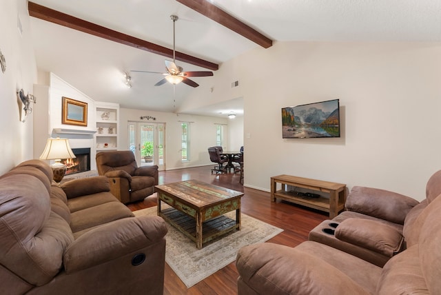 living room featuring dark wood-type flooring, ceiling fan, high vaulted ceiling, and beamed ceiling