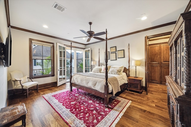 bedroom featuring dark wood-type flooring, ceiling fan, and crown molding