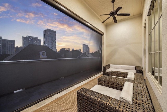 interior space with ceiling fan