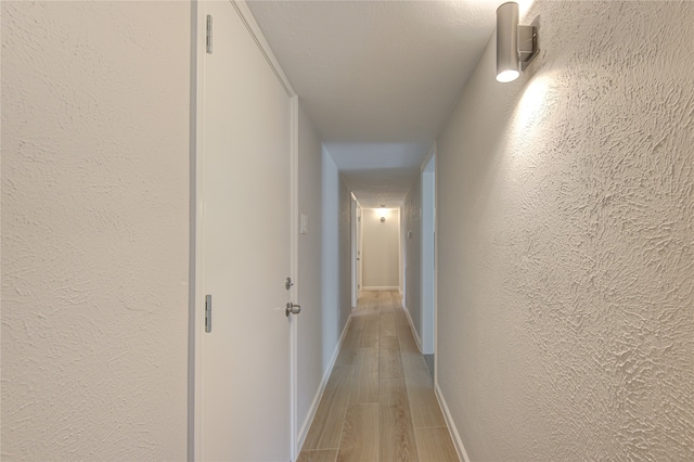 hall featuring light hardwood / wood-style flooring