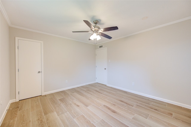 unfurnished room with ceiling fan, light wood-type flooring, and crown molding