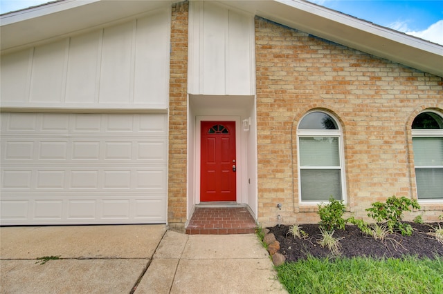 entrance to property featuring a garage