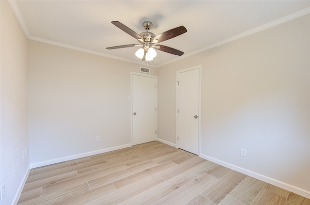 unfurnished room featuring ornamental molding, light hardwood / wood-style flooring, and ceiling fan