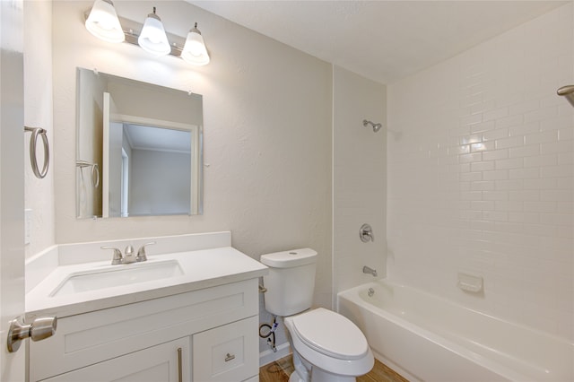 full bathroom featuring toilet, vanity, tiled shower / bath, and wood-type flooring