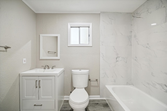 full bathroom featuring vanity, toilet, wood-type flooring, and tiled shower / bath