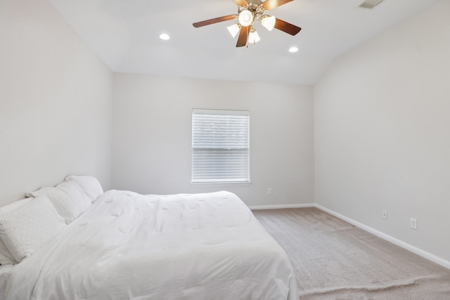 bedroom with lofted ceiling, carpet floors, and ceiling fan