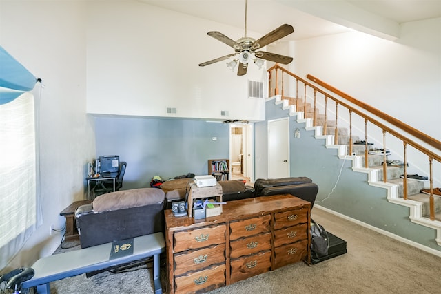 interior space featuring beamed ceiling, carpet floors, high vaulted ceiling, and ceiling fan