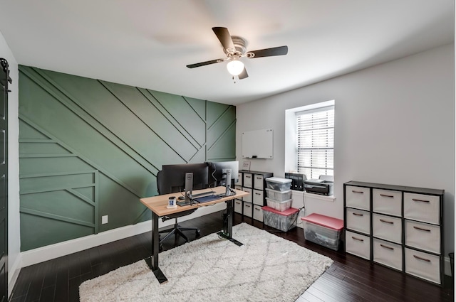 office area featuring ceiling fan and dark hardwood / wood-style flooring