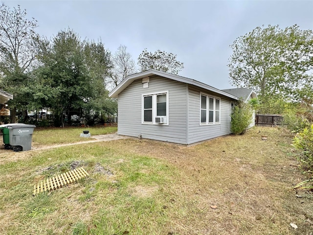 view of property exterior featuring a yard